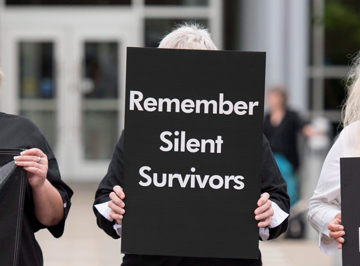 A mourner opposing violence against women