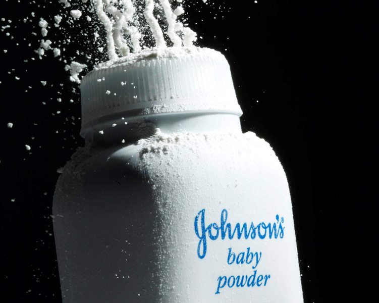 In this April 19, 2010 file photo, Johnson's Baby Powder is squeezed from its container to illustrate the product, in Philadelphia.
