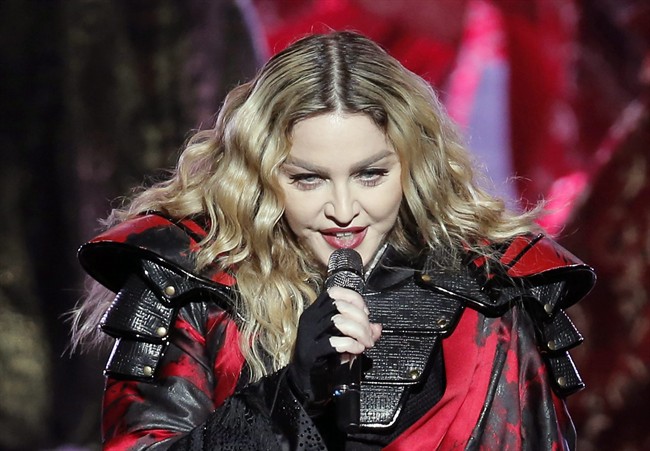 FILE - In this Feb. 20, 2016 file photo, U.S. singer Madonna performs during the Rebel Heart World Tour in Macau.