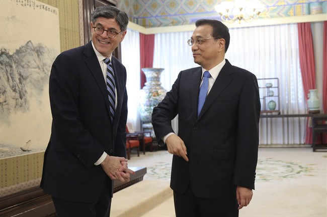U.S. Secretary of the Treasury Jacob Lew, left, reets Chinese Premier Li Keqiang ahead of a meeting in Zhongnanhai Leadership Compound in Beijing, China, Monday, Feb. 29, 2016.