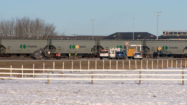 Saskatoon police are asking drivers to avoid the area where a crash between a train and a semi took place Tuesday.