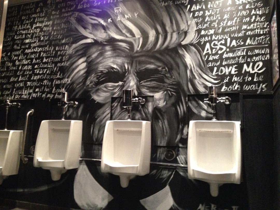 District Stop nightclub in the Exchange District turned its bathroom wall in a mural of Donald Trump.