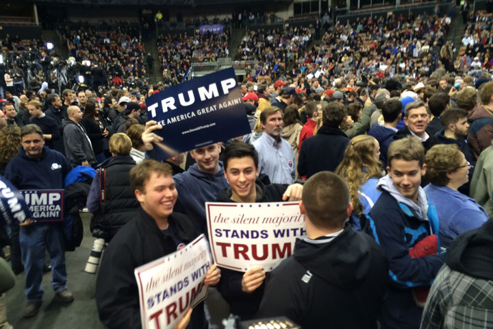 Supporters at a Donald Trump rally in Manchester, NH wait for their candidate to arrive.