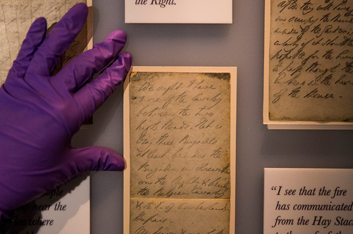 Battle orders handwritten by the Duke of Wellington on scraps of vellum are presented by a member of staff at Wellington Arch on April 15, 2015 in London, England.  