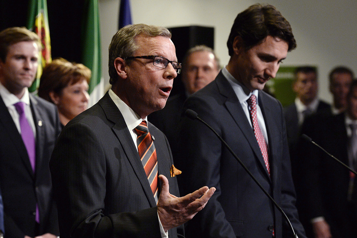 Saskatchewan Premier Brad Wall speaks following the family photo op during a First Ministers meeting at the Canadian Museum of Nature in Ottawa on Monday, Nov. 23, 2015. 