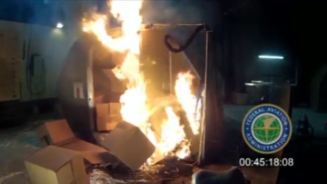 This file frame grab from video, provided by the U.S. Federal Aviation Administration shows a test at the USFAAs technical center in Atlantic City, N.J., in April 2014, where a cargo container was packed with 5,000 rechargeable lithium-ion batteries.