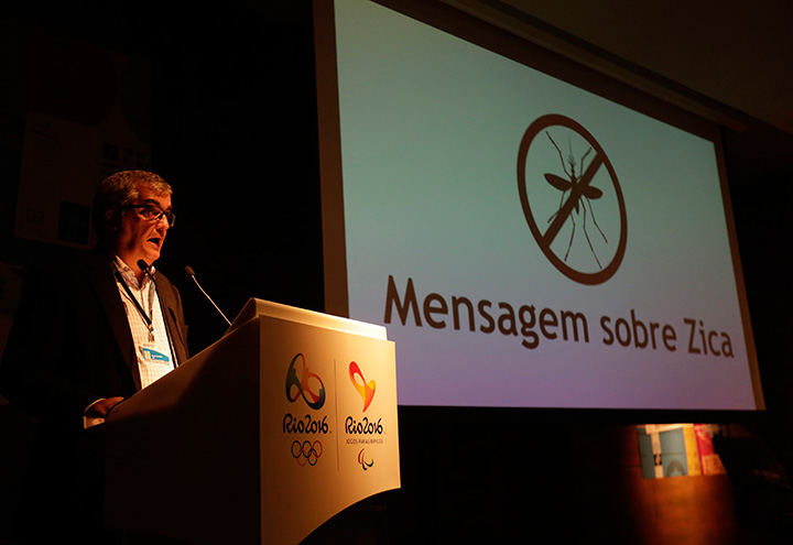 Mario Andrada, spokesperson for the Rio Olympic Organizing Committee, speaks next to a screen that reads in Portuguese : "Message about Zika" during a media briefing in Rio de Janeiro, Brazil, Tuesday, Feb. 2, 2016. 