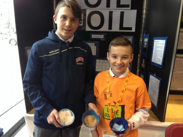 Max Grégoire (L) and Tristan Nellis (R) from Kuper Academy show off their oil spill project, Monday, March 14, 2016.