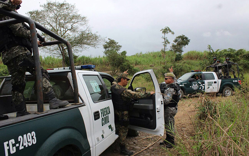 Members of Veracruz Civil Force patrol during an operation in Veracruz, Mexico. 