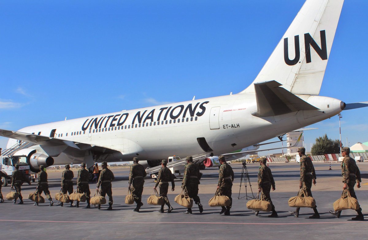 Soldiers board a United Nations flight to Central African Republic as a peacekeeping force in Nouakchott, Mauritania,  Sunday, Feb 21, 2016.  