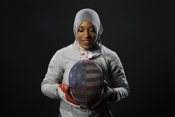 Fencer Ibtihaj Muhammad poses for photos at the 2016 Olympic Team USA media summit Tuesday, March 8, 2016, in Beverly Hills, Calif.
