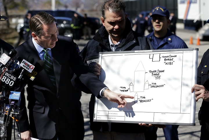 Westchester County Executive Rob Astorino, left, uses a diagram to explain the circumstances of a fatal collision on the water in Tarrytown, N.Y., Saturday, March 12, 2016.