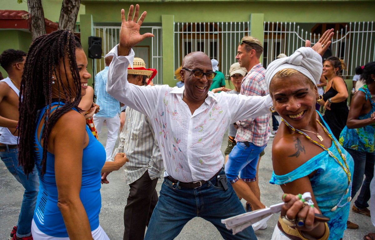 Cubans enjoy a weekly rumba dance gathering in Havana, Cuba, Saturday, March 19, 2016. President Barack Obama will travel to the communist island March 20. During his three-day trip, the first to the country by a sitting president in nearly 90 years he will meet with President Raul Castro at the Palace of the Revolution and attend a baseball exhibition game.