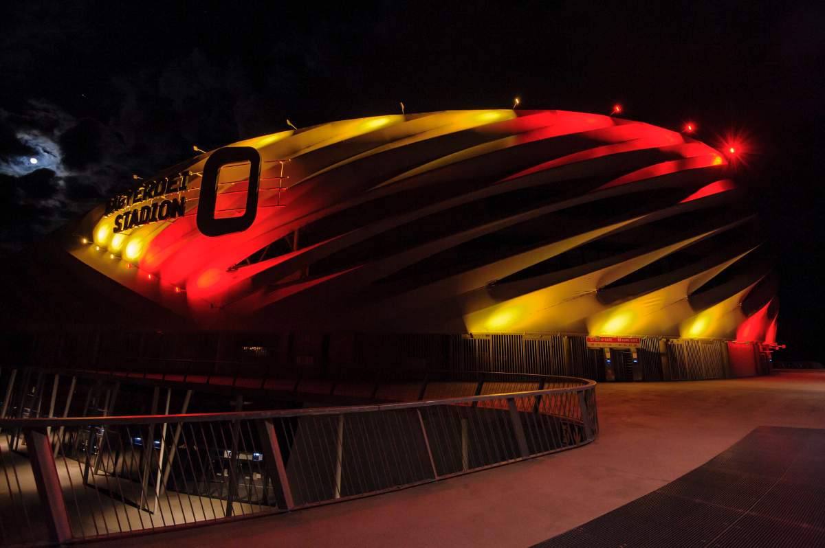 Nagyardei Stadium is illuminated with the Belgian national colours in Debrecen, 226 kms east of Budapest, Hungary, Tuesday, March 22, 2016 to pay tribute to victims of the terrorist attacks committed earlier Tuesday in Brussels, the capital of Belgium. Dozens of people were killed and more than 200 injured when bombs were detonated at Brussel’s Zaventem international airport and at a metro station of the city. ()