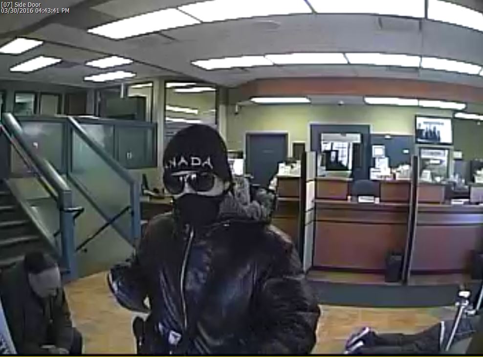 The armed robbery suspect allegedly entered the Credit Union and presented a handgun before demanding money. 