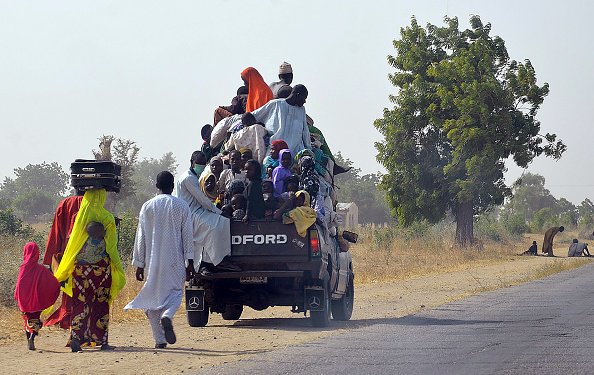 A loaded truck wait to carry people fleeing from Boko Haram Islamists at Mairi village outskirts of Maiduguri capital of northeast Borno State, on February 6, 2016.