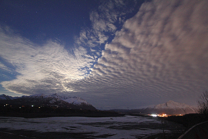 Clouds seen over Lazy Mountain and the Matanuska River on Wednesday, March 23, 2016, in Palmer, Alaska. 