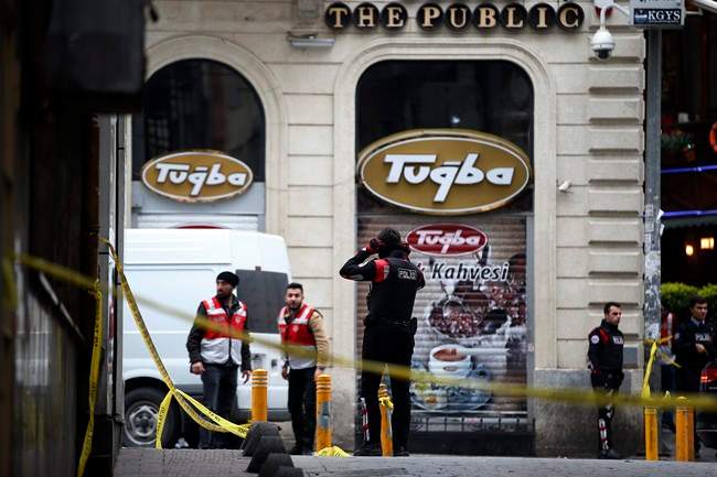 Security officials seen at the site after an explosion on a street, in Istanbul, Turkey, Saturday, March 19, 2016. An explosion on Istanbul’s main pedestrian shopping street on Saturday has killed a number of people and injured over a dozen others.