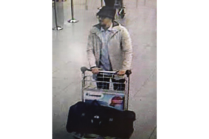 In this image provided by the Belgian Federal Police in Brussels on Tuesday, March 22, 2016, a man who is suspected of taking part in the attacks at Belgium's Zaventem Airport. 