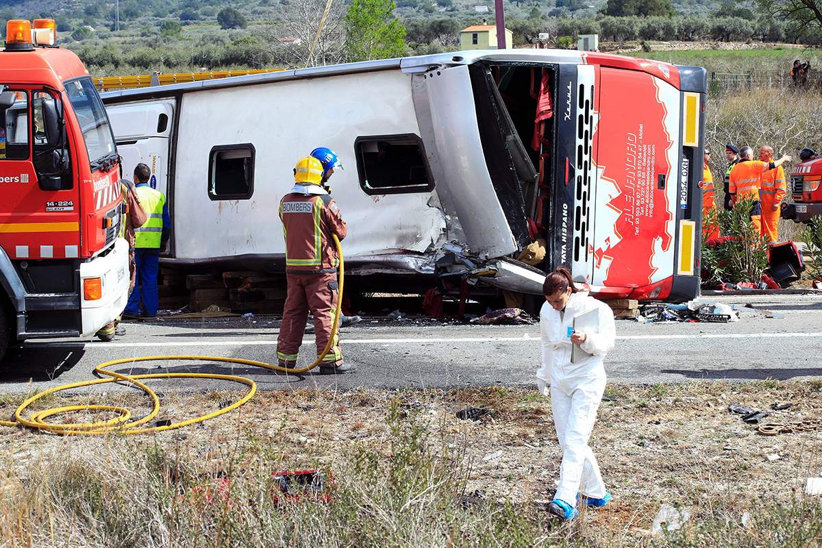 Emergency personnel operate on the Spanish AP-7 motorway.