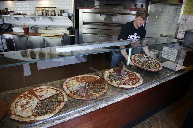 When B.C.'s minimum wage climbs to $12.65 in June, it will still be more than $8 per hour below Metro Vancouver's "living wage.".