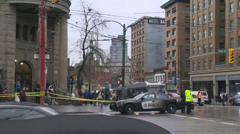 Vancouver police investigate a fatal stabbing at Main and Hastings Street on March 20, 2016. 