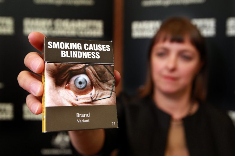 Federal Minister for Health, Nicola Roxon, introduces the new generic plain paper packaging for cigarettes in Sydney, Australia, in April 2011.