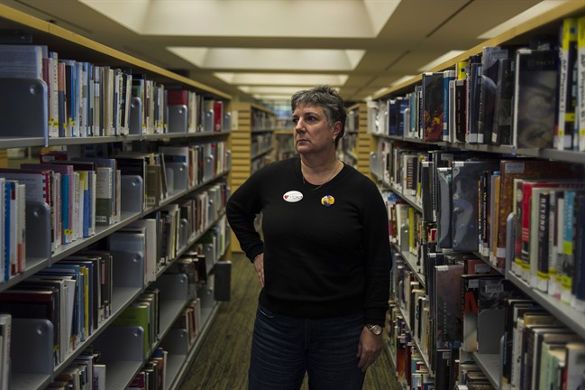 Maureen O'Reilly, a librarian and president of the Toronto Public Library Workers Union, poses for a portrait in Toronto on Thursday, March 24, 2016. They're part-time employees without health benefits or pensions who work split shifts at a number of different locations each week. From one paycheque to the next, their income fluctuates, as do their hours. THE CANADIAN PRESS/Christopher Katsarov.