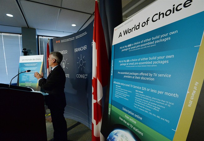 CTRC Chairman Jean-Pierre Blais speaks to media at the CRTC offices in Gatineau, Que., on March 19, 2015.