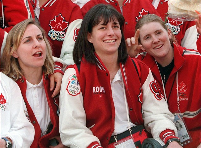 Stacey Wilson, Manon Rheaume and Hayley Wickenheiser (left to right) of the Canadian Women's Olympic hockey team ham it up as they pose for a picture on their arrival at the Olympic Athlete Village Tuesday, Feb.3, 1998 in Nagano, Japan.Three of her Canadian teammates weren't yet born when Hayley Wickenheiser won her first women's world hockey championship in 1994.