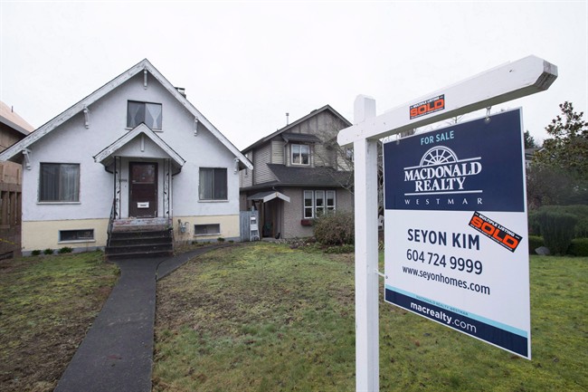 A sold home is pictured in Vancouver, B.C., Thursday, Feb. 11, 2016.