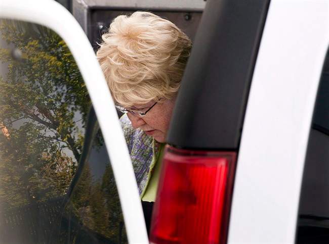 Melissa Ann Shepard arrives at Supreme Court in Sydney, N.S., for her sentencing hearing on Tuesday, June 11, 2013. Two men preyed upon by an elderly woman known as the "Internet Black Widow" say they fear for public safety as a Nova Scotia prison prepares to release her onto the street.