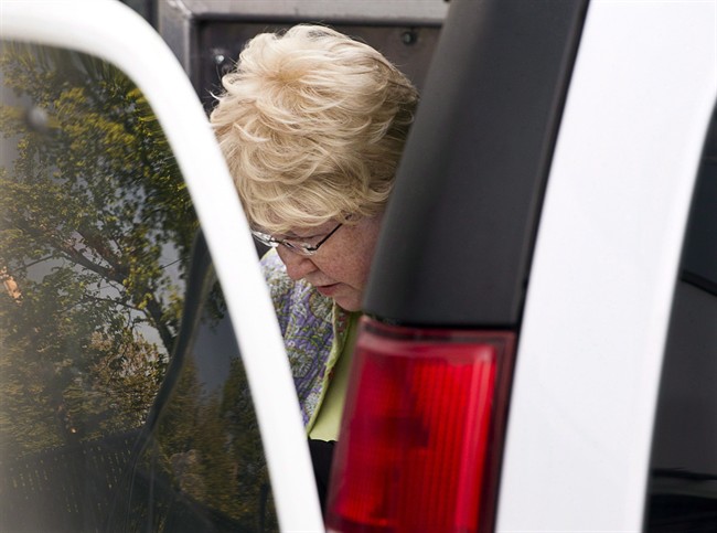 Melissa Ann Shepard arrives at Supreme Court in Sydney, N.S., for her sentencing hearing on Tuesday, June 11, 2013. Two men preyed upon by an elderly woman known as the "Internet Black Widow" say they fear for public safety as a Nova Scotia prison prepares to release her onto the street.