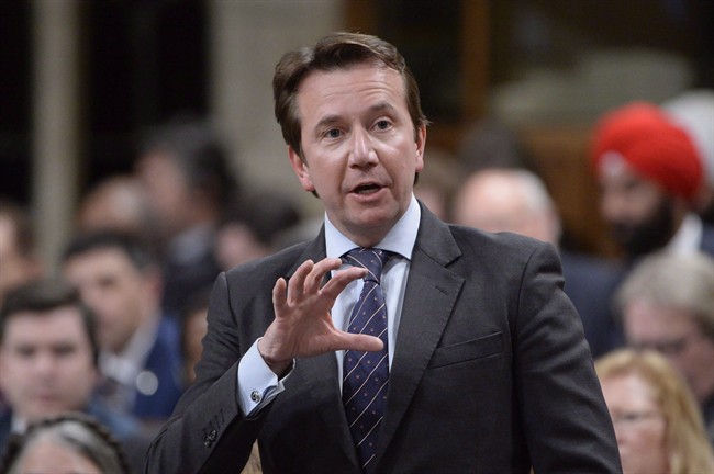 President of the Treasury Board Scott Brison answers a question during Question Period in the House of Commons on Parliament Hill in Ottawa, on Monday, Feb.1, 2016.