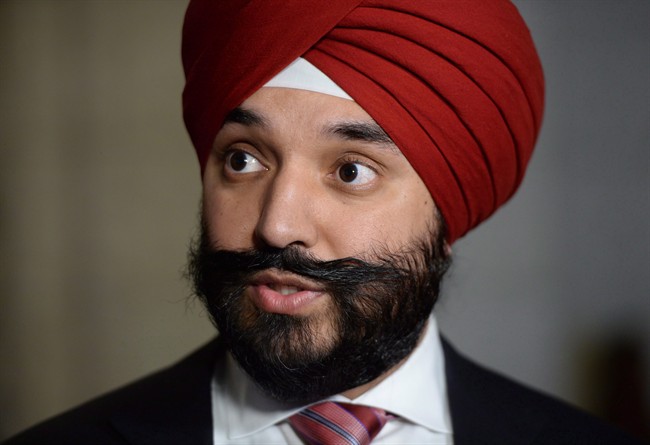 Innovation, Science and Economic Development Minister Navdeep Bains speaks to reporters following a cabinet meeting on Parliament Hill in Ottawa on Tuesday, Feb. 23, 2016. THE CANADIAN PRESS/Sean Kilpatrick.
