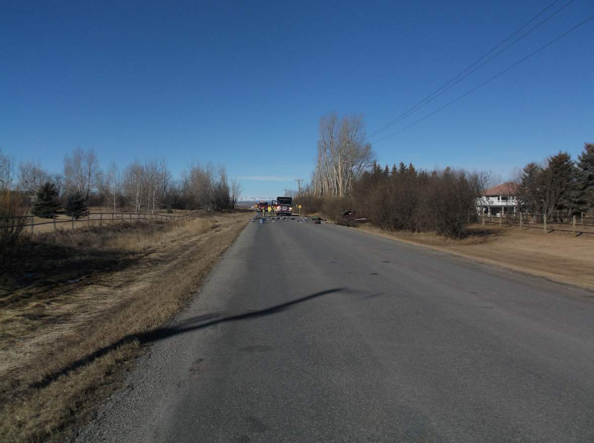 Emergency crews respond to a fatal collision south of Calgary on Dunbow Road on Monday, March 7, 2016.