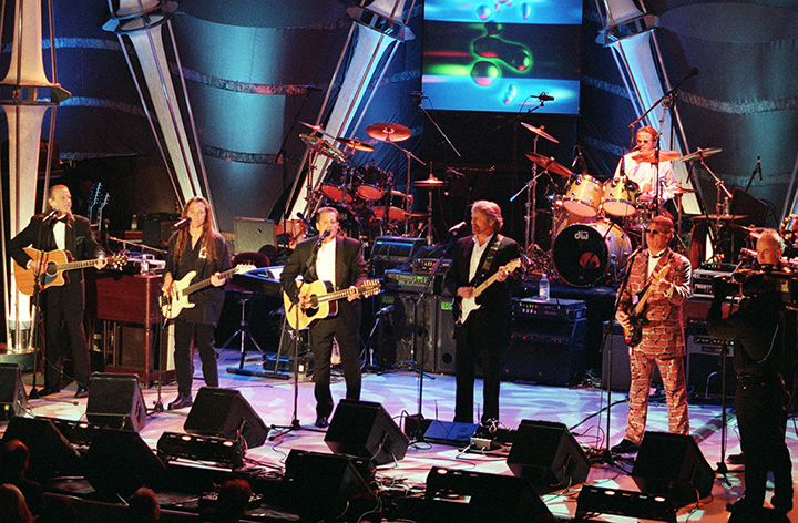 FILE - The Eagles (from left:) Randy Meisner, Timothy Schmit, Glenn Frey, Don Felder, Joe Walsh, Don Henley and Bernie Leadon, appear together on stage after receiving their awards and being inducted into the Rock & Roll Hall of Fame in New York.