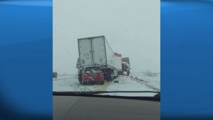 Saskatoon RCMP want drivers to slow down when encountering icy and wet conditions, like what was seen near Plunkett where two semi-trucks collided Monday.