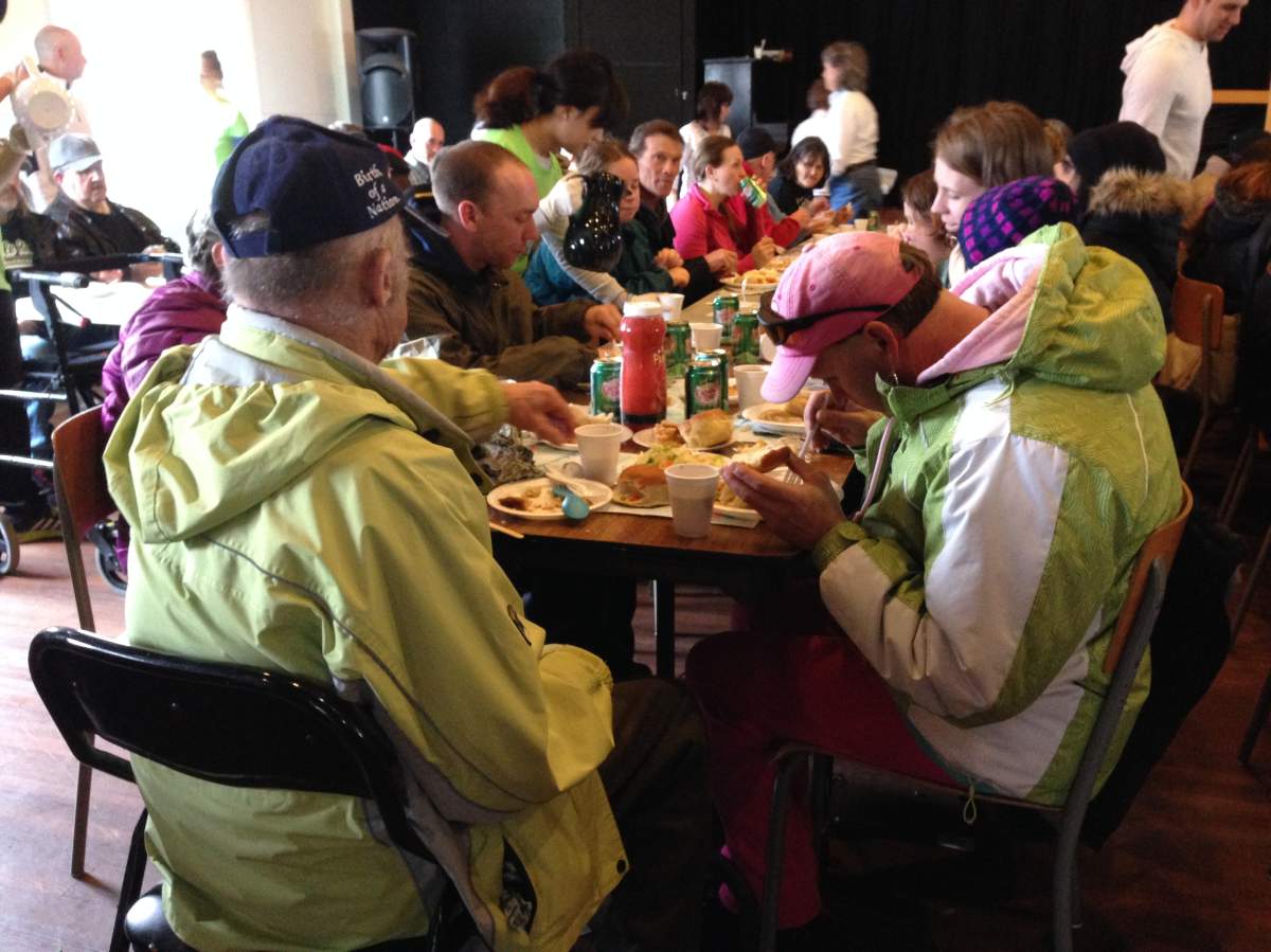Guests enjoy Easter dinner at the Souls Harbour Rescue Mission in Halifax.