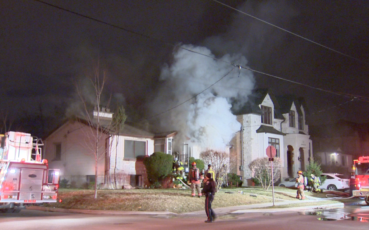Crews attend to a 2-alarm fire in North York on March 31, 2016.