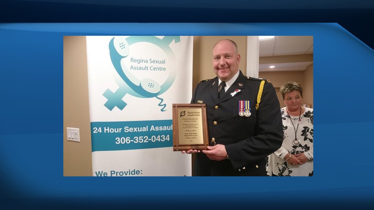Insp. Evan Bray of the Regina Police Service accepts the Ulmer-Hildebrandt award for his work against sexual assault in our city.