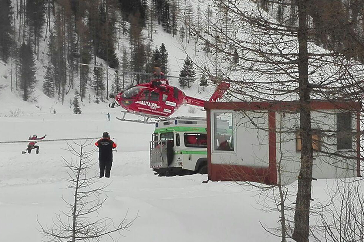 A rescue helicopter takes off  in Valle Aurina, in the Italian Alps, in order to reach the spot in Monte Nevoso where six backcountry skiers have died in an avalanche Saturday, March 12, 2016.