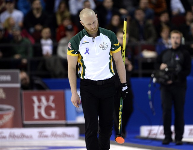 Northern Ontario skip Brad Jacobs reacts after a shot during a draw against Alberta during semi-final competition at the Tim Hortons Brier men's curling championship in Ottawa on Saturday March 12, 2016. 