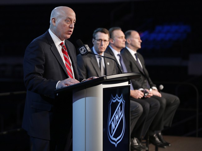 NHL Deputy Commissioner Bill Daly announces the Heritage Classic between the Winnipeg Jets and the Edmonton Oilers on Sunday as Jets Chairman Mark Chipman, Hockey Hall of Fame member Dale Hawerchuk and Oilers Entertainment Group Vice-Chairman Kevin Lowe listen in.