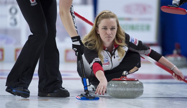 Team Canada's Chelsea Carey makes a shot during the first draw against Denmark at the Ford World Women's curling in Swift Current, Sask. Saturday, March 19, 2016.
