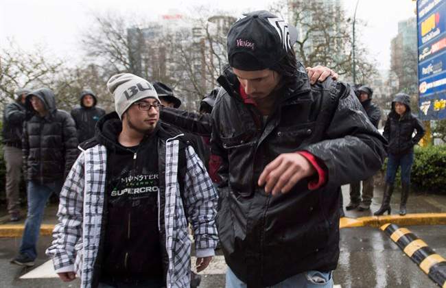 A report says giving two homeless men in Saskatchewan one-way bus tickets to British Columbia was within Social Services policy but the situation could have been better handled.