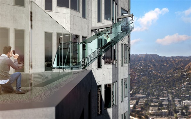 This undated artist's rendering provided by Overseas Union Enterprise Limited shows a glass slide 1,000 feet above the ground off the side of the U.S. Bank Tower in downtown Los Angeles.