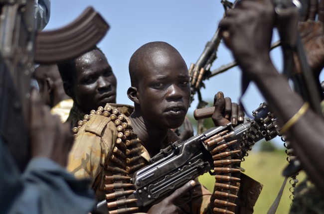 In this file photo of Friday, Sept. 25, 2015. South Sudan government soldiers in the town of Koch, Unity state, South Sudan.