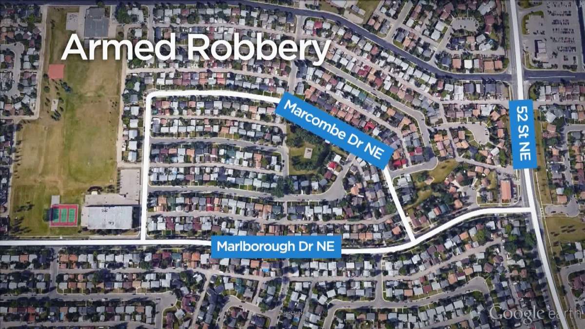 Police investigate an armed robbery at a Mac's Convenience Store located in the 1400 block of 52 Street N.E. 