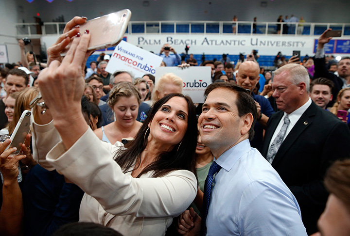 Republican presidential candidate Sen. Marco Rubio poses for a photograph during a campaign rally at Palm Beach Atlantic University in West Palm Beach, Fla., Monday, March 14, 2016. 